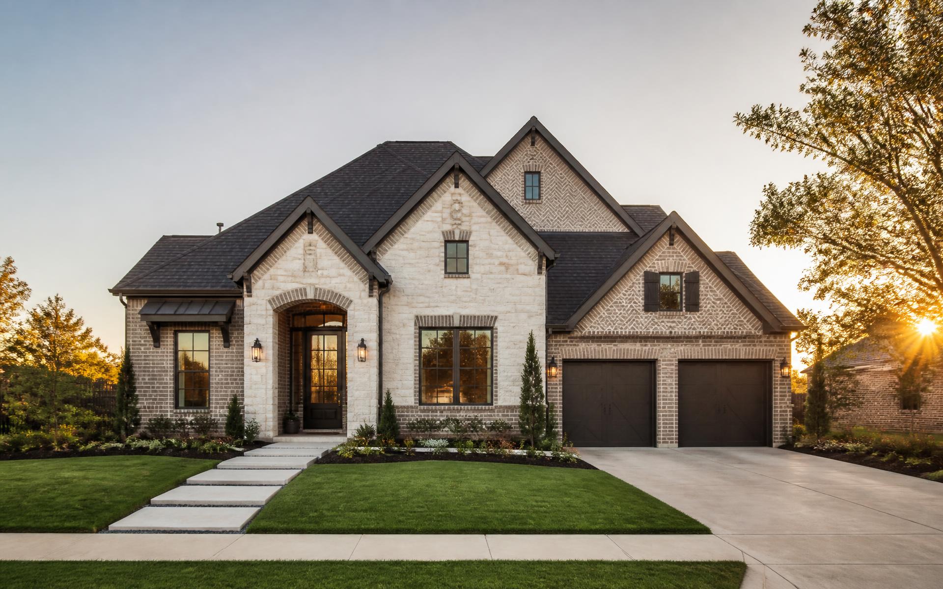 North Texas home with a newly completed shingle roof at dusk